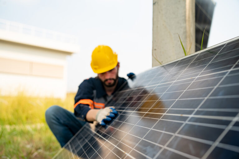 Engineer hand is installing and checking an operation of sun and cleanliness of photovoltaic solar panels, Engineer with energy measurement tool photovoltaic modules for renewable energy